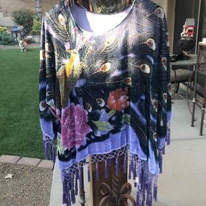 Tunic top, sequin peacock on front and sequin tassels on sleeves and bottom.